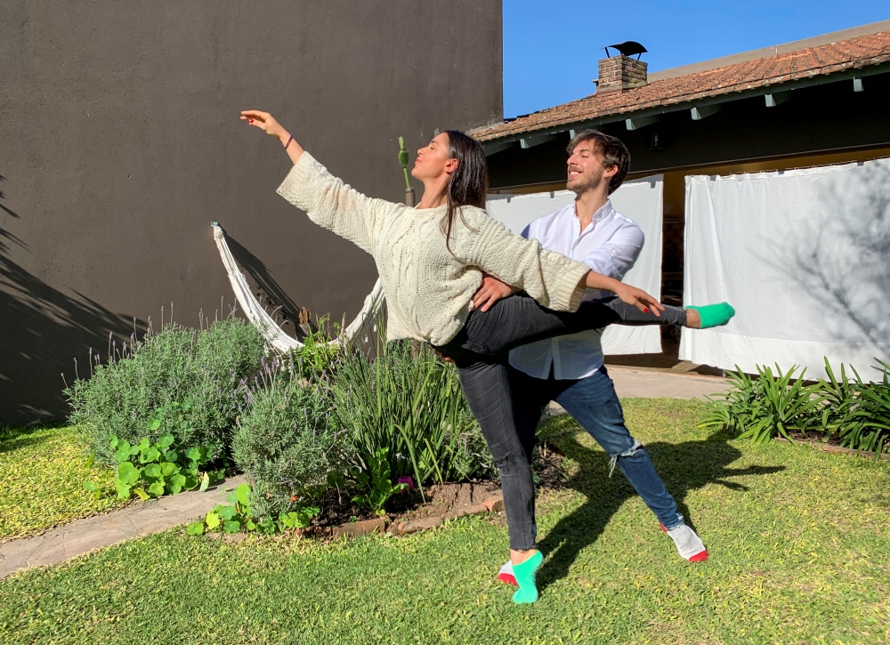 Dancers Manuela Lavalle and Facundo Luqui, who started with a colleague an international dance competition that encourages people to dance from home, as most theatres are closed due to the coronavirus disease (COVID-19) outbreak, pose for a photograph in 