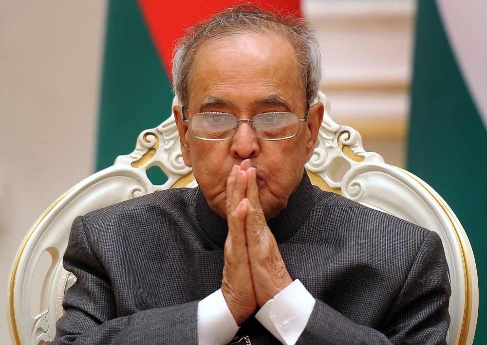 In this file photo taken on June 3, 2015 the then India's President Pranab Mukherjee listens to his Belarus' counterpart during a signing ceremony at the Presidential Palace in Minsk. / AFP / SERGEI GAPON
