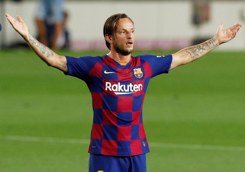Barcelona's Ivan Rakitic reacts, as play resumes behind closed doors following the outbreak of the coronavirus disease (COVID-19) REUTERS/Albert Gea/File Photo
