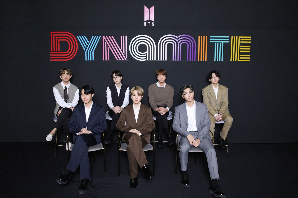 This handout photo taken in Seoul on September 2, 2020 and provided by Big Hit Entertainment shows K-pop group BTS members posing for a photo as they hold an online global media day. 