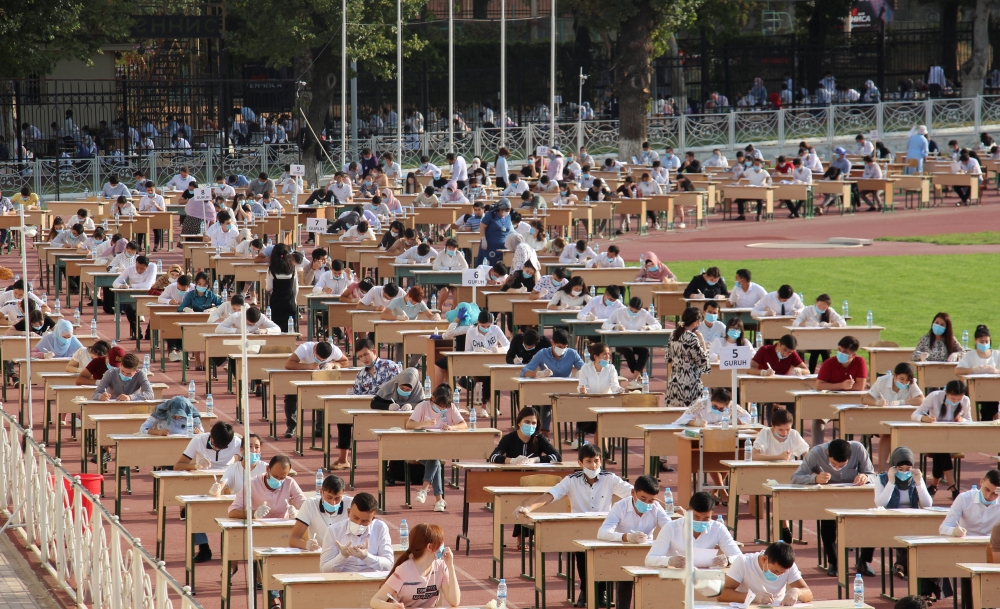 School graduates take university entrance exams at the Pakhtakor sports arena amid the outbreak of the coronavirus disease (COVID-19) in Tashkent, Uzbekistan September 2, 2020. REUTERS/Mukhammadsharif Mamatkulov