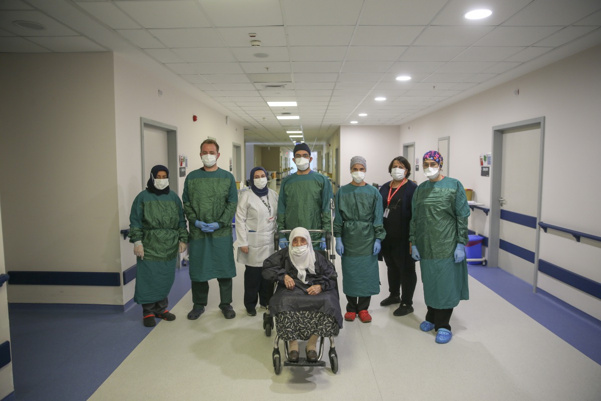 ANKARA, TURKEY - AUGUST 28: 96-year-old Hasibe Yavuz (Front C) is being discharged from the Ankara City Hospital after recovering from coronavirus (COVID-19), in Ankara, Turkey on August 28, 2020. Despite her age and chronic disease she managed to beat CO