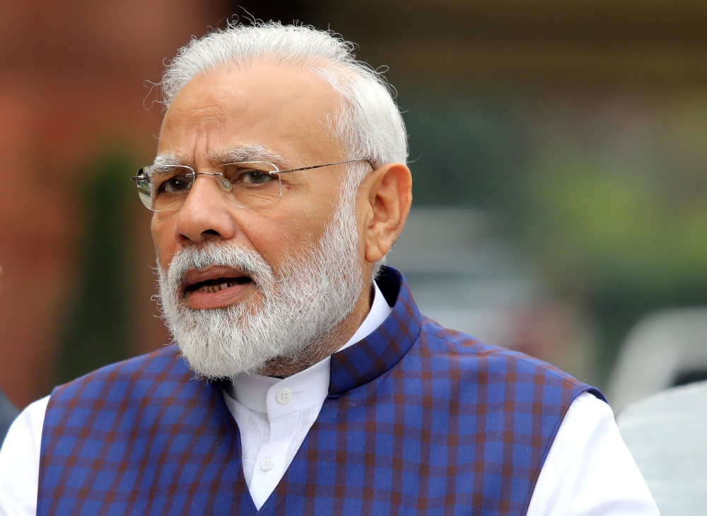 Indian Prime Minister Narendra Modi speaks to the media in New Delhi, India, November 18, 2019. REUTERS/Altaf Hussain/File Photo