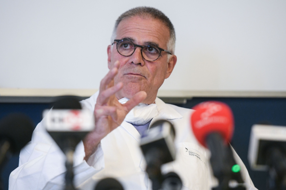 Italian professor Alberto Zangrillo, San Raffaele Hospital’s personal doctor of former Italian prime minister Silvio Berlusconi, speaks during a press conference after Berlusconi was hospitalised after testing positive for COVID-19, at the San Raffaele Ho
