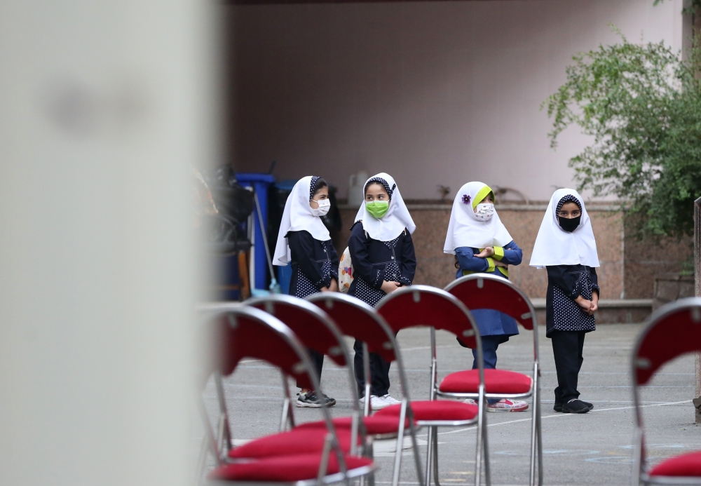 Iranian students wearing mask are seen in school after the Ministry of Education of Iran plans the opening of schools and education to be done remotely in some schools according to the coronavirus (Covid-19) risk level in Tehran, Iran, September 05, 2020.