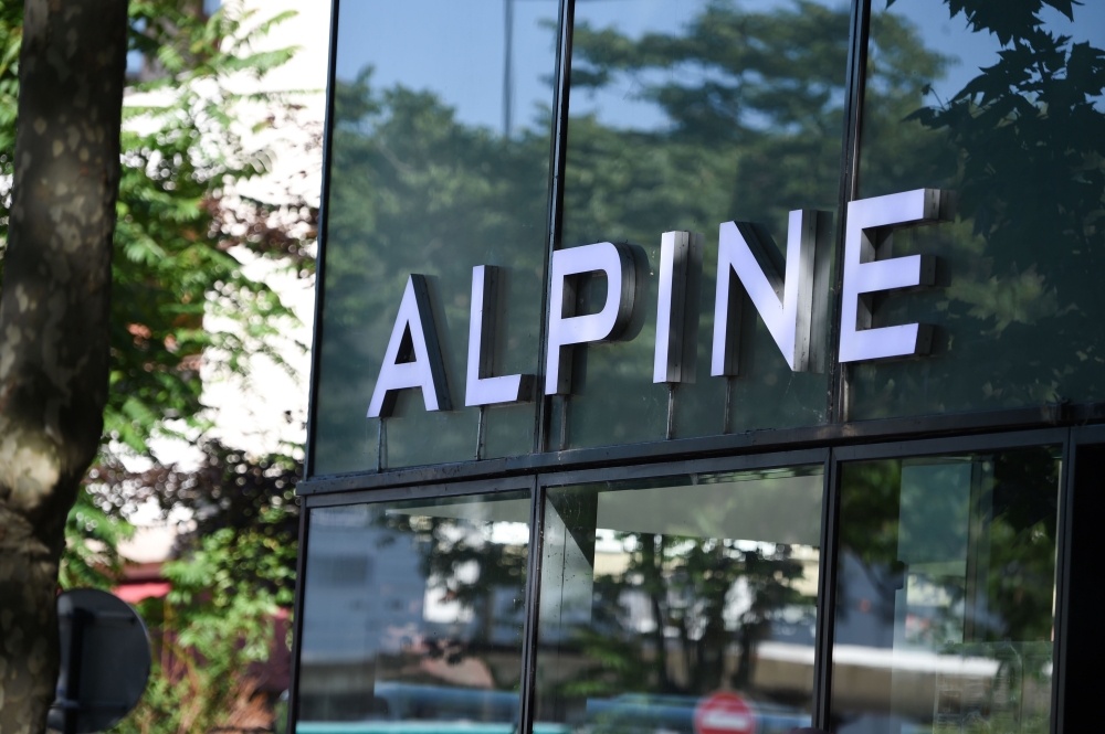This file photo taken on May 29, 2020 shows the Alpine logo above the showroom in Boulogne Billancourt forfamly known as 'Societe Automobiles Alpine SAS', commonly known as Alpine. Renault will change the name of their Formula One team to Alpine from next