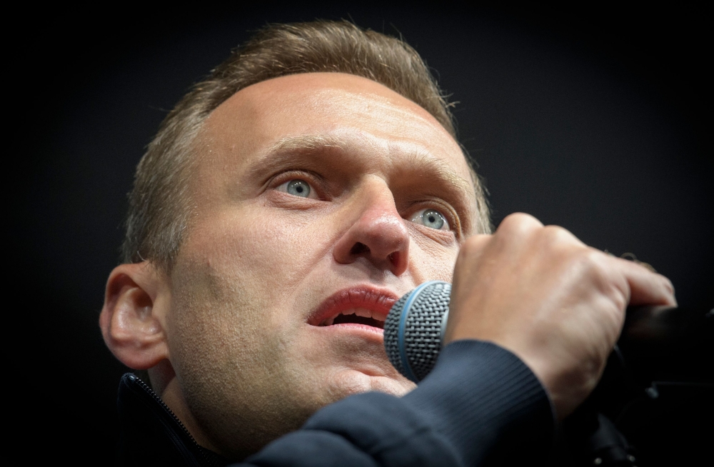 FILE PHOTO: Russian opposition leader Alexei Navalny delivering a speech during a demonstration in Moscow.  / AFP / Yuri KADOBNOV