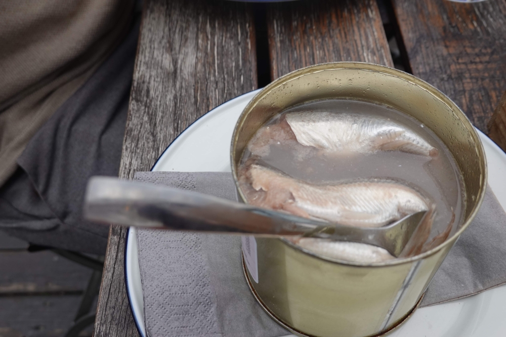 A can of fermented Baltic herring, known as surstromming in Swedish, sits on a table in the restaurant belonging to chef Malin Soderstrom who invited a group of friends to try the delicacy in her restaurant as a demonstration of how she prepares the stron