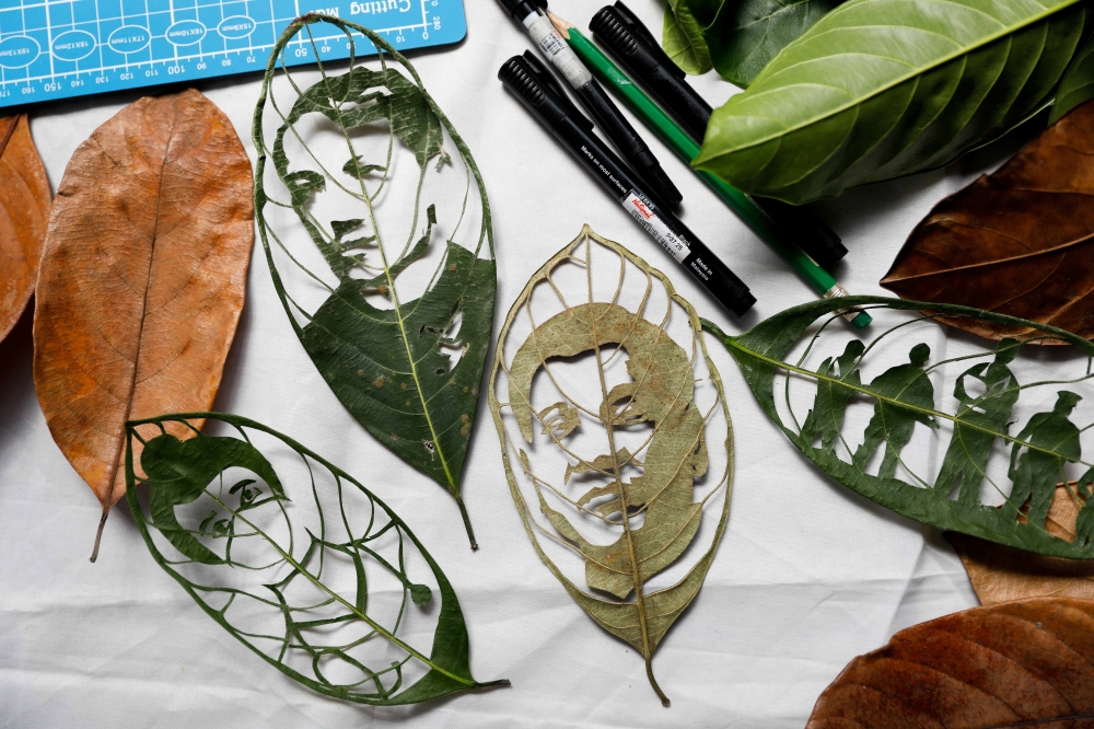 Some of Filipino artist Mary Mae Dacanay's leaf artworks are photographed in her home, in Binan, Laguna, Philippines, September 1, 2020. Picture taken September 1, 2020. REUTERS/Eloisa Lopez