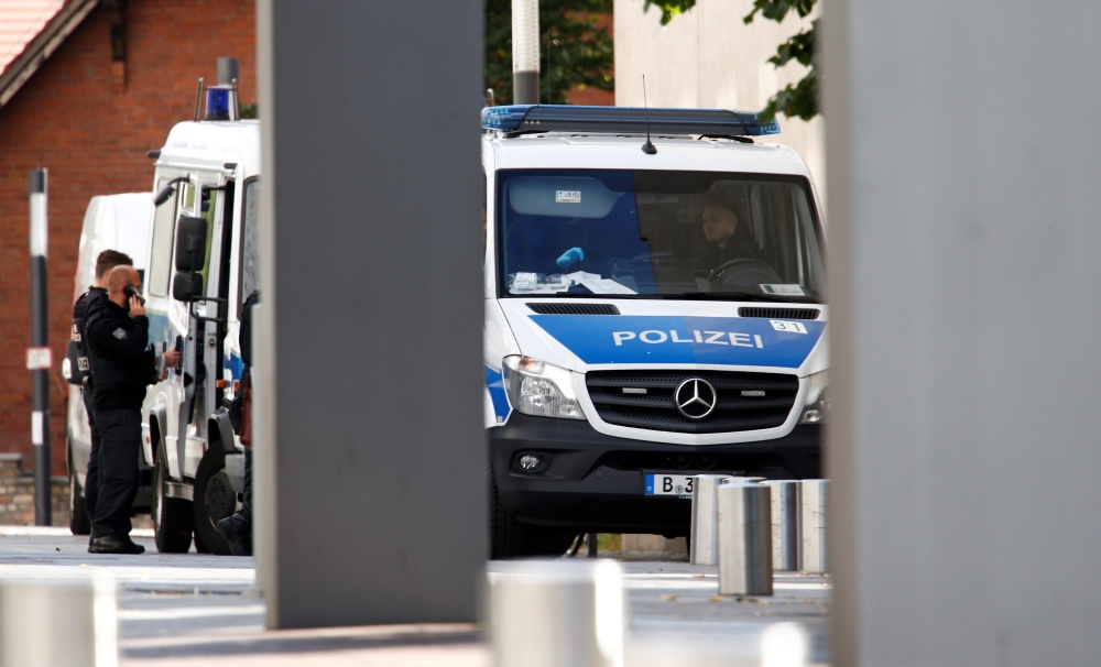 Police officers are seen outside Charite Mitte Hospital Complex after Russian opposition leader and President Vladimir Putin critic Alexei Navalny came out of a medically induced coma, in Berlin, Germany, September 10, 2020. REUTERS/Michele Tantussi