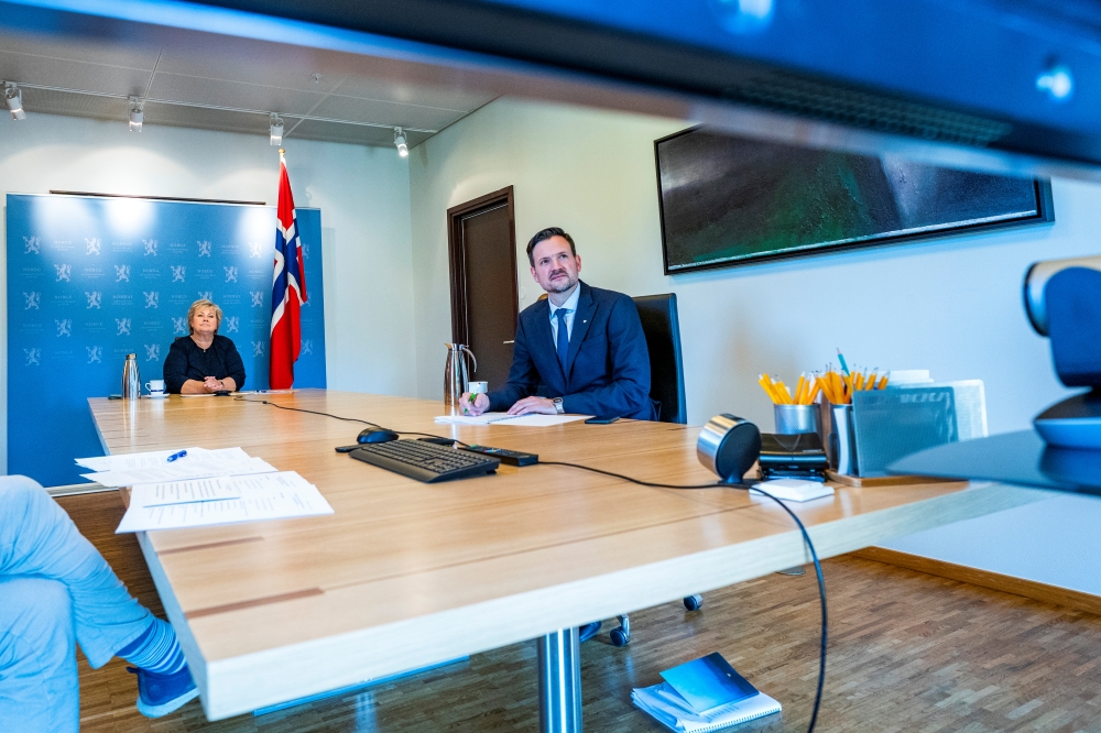 Norwegian Prime Minister Erna Solberg and Minister for Development Aid Dag Inge Ulstein participate in a digital meeting with international leaders about a fair global distribution of coronary vaccines, at the Prime Minister's office in Oslo, Norway Septe
