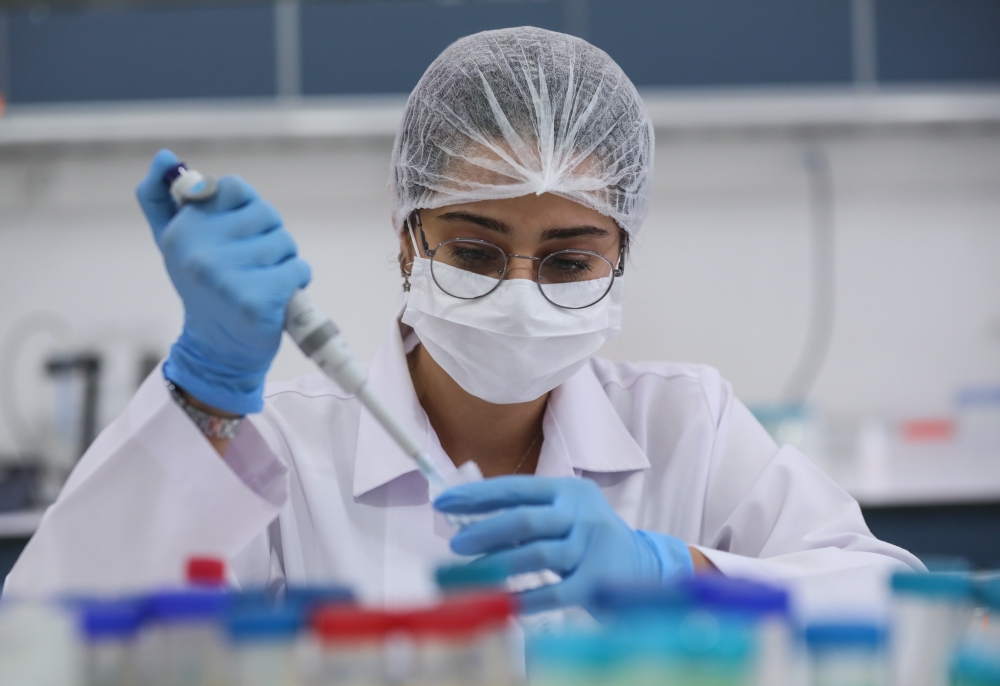 An official works at laboratory for antibody tests developed at Turklab firm on coronavirus (Covid-19) pandemic process in Izmir, Turkey on September 12, 2020. (Mahmut Serdar Alaku? - Anadolu Agency)
