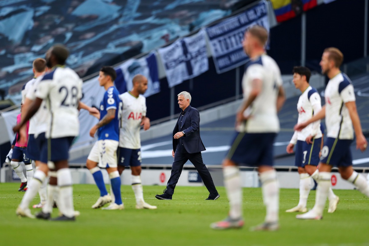 Tottenham Hotspur's Portuguese head coach Jose Mourinho (C) walks on to the pitch at the end of the game during the English Premier League football match between Tottenham Hotspur and Everton at Tottenham Hotspur Stadium in London, on September 13, 2020. 