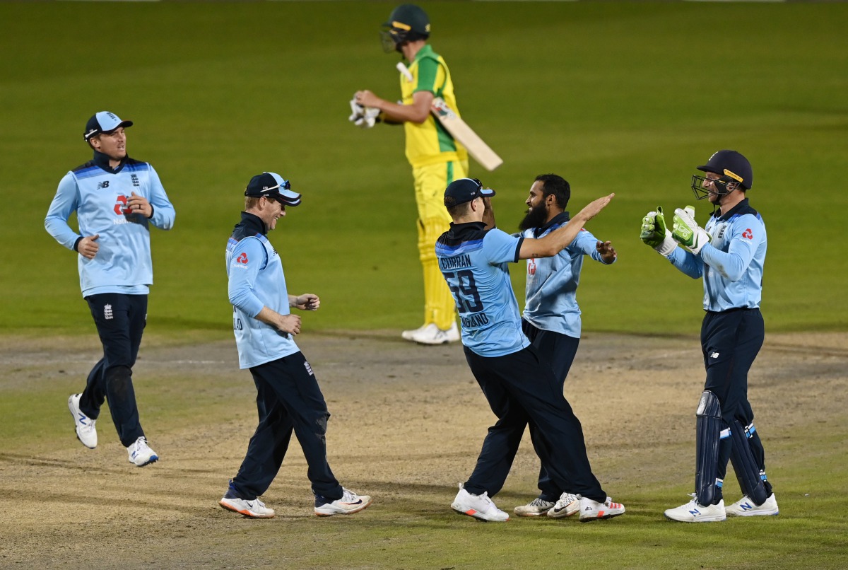 Cricket - Second One Day International - England v Australia - Emirates Old Trafford, Manchester - September 13, 2020 England players celebrate winning the match after the wicket of Australia's Alex Carey Pool via REUTERS/Shaun Botterill
