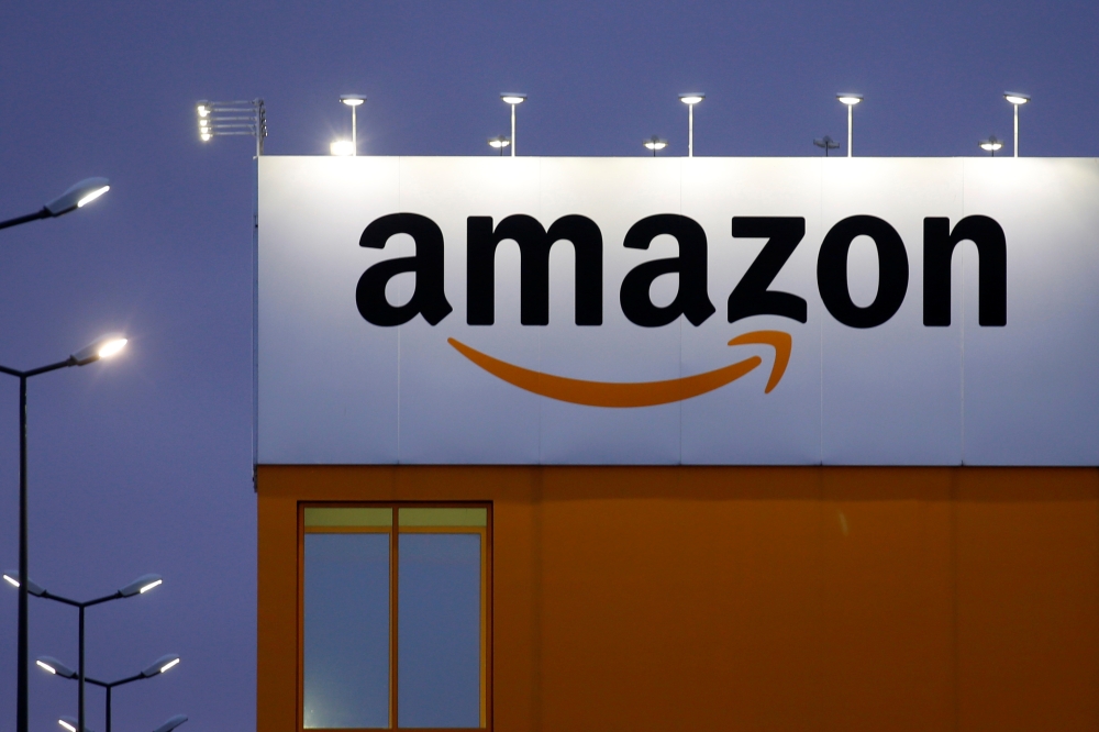 The logo of Amazon is seen at the company logistics center in Lauwin-Planque, northern France, February 20, 2017. REUTERS/Pascal Rossignol/File Photo