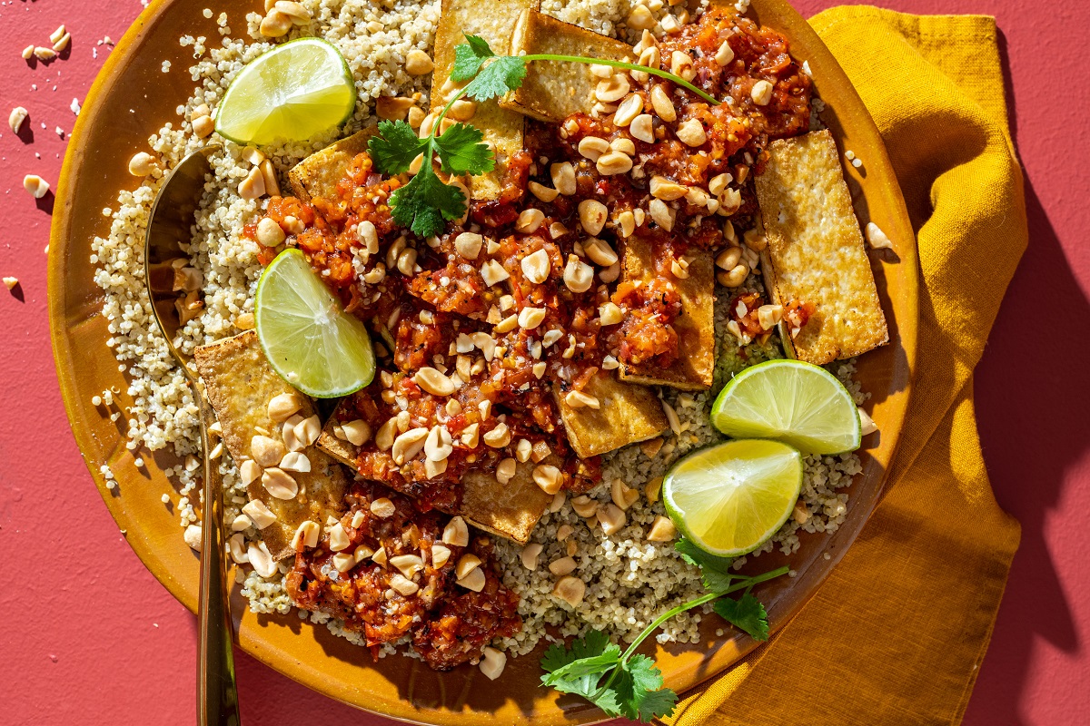 Green Curry-Coconut Quinoa With Tofu and Chile-Garlic Sauce. MUST CREDIT: Photo by Laura Chase de Formigny for The Washington Post.
