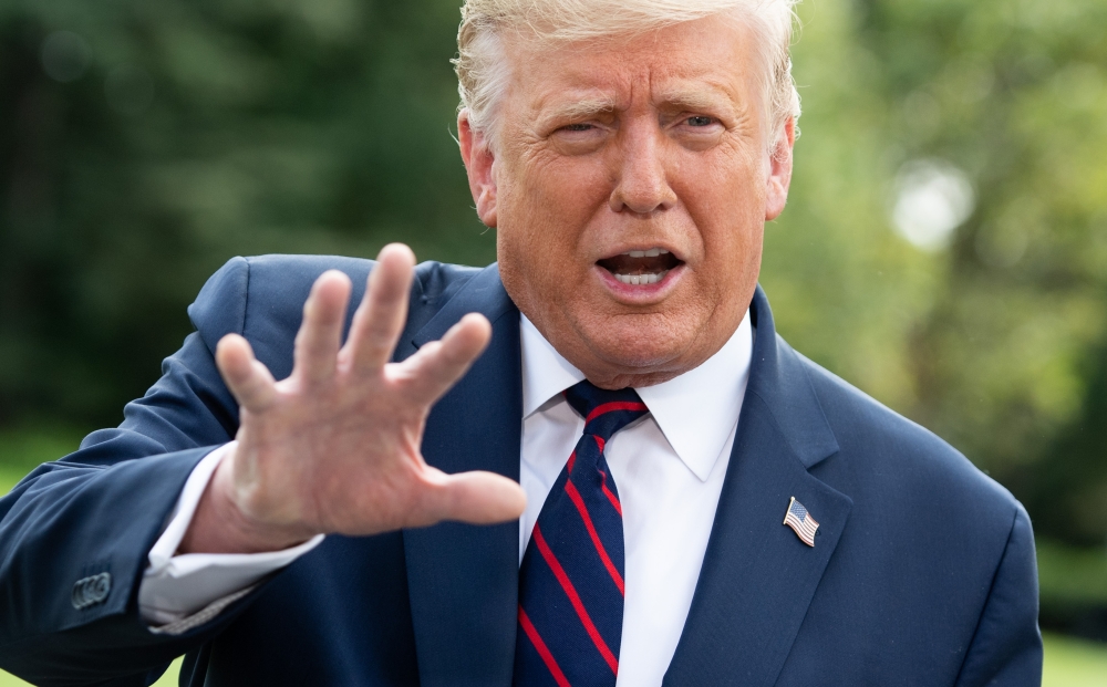 In this file photo US President Donald Trump speaks to the media prior to departing on Marine One from the South Lawn of the White House in Washington, DC, September 15, 2020, as he travels to Philadelphia, Pennsylvania for a town hall. AFP / SAUL LOEB