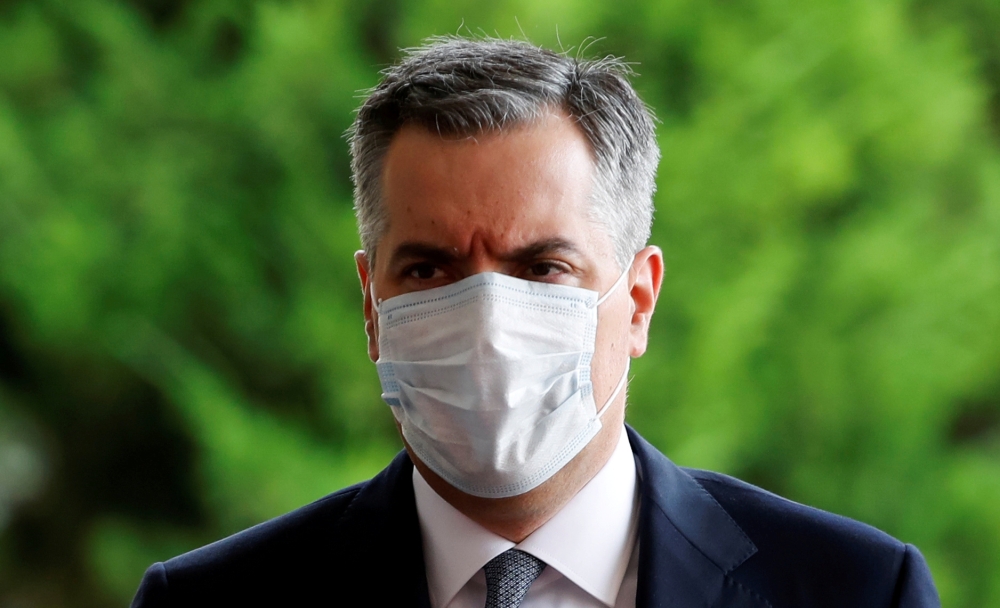 FILE PHOTO: Newly appointed Lebanese Prime Minister Mustapha Adib wears a protective face mask as he arrives to attend a meeting with French President Emmanuel Macron at the presidential palace in Baabda, Lebanon September 1, 2020. REUTERS/Gonzalo Fuentes