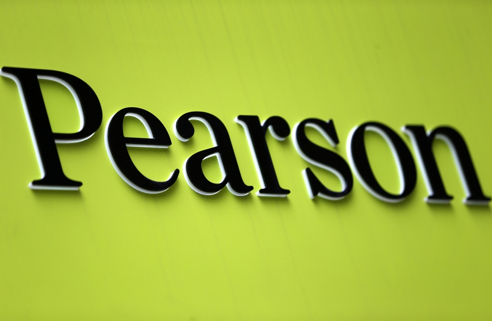 The company logo is displayed outside the Pearson offices in London, Britain August 4, 2017. REUTERS/Neil Hall/File Photo