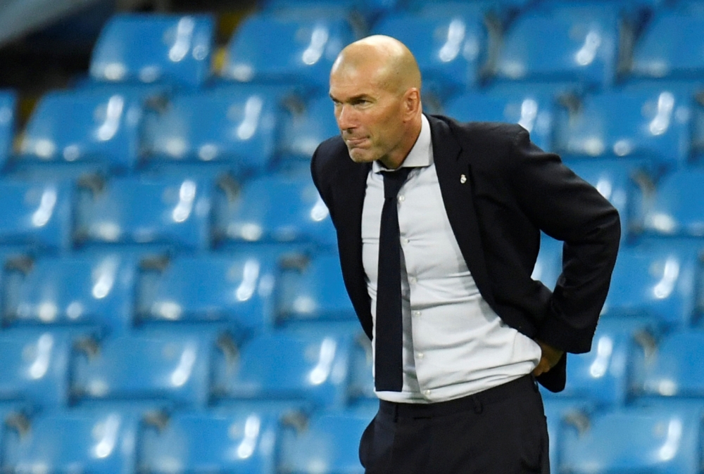 Real Madrid coach Zinedine Zidane reacts. Pool via REUTERS/Peter Powell/File Photo