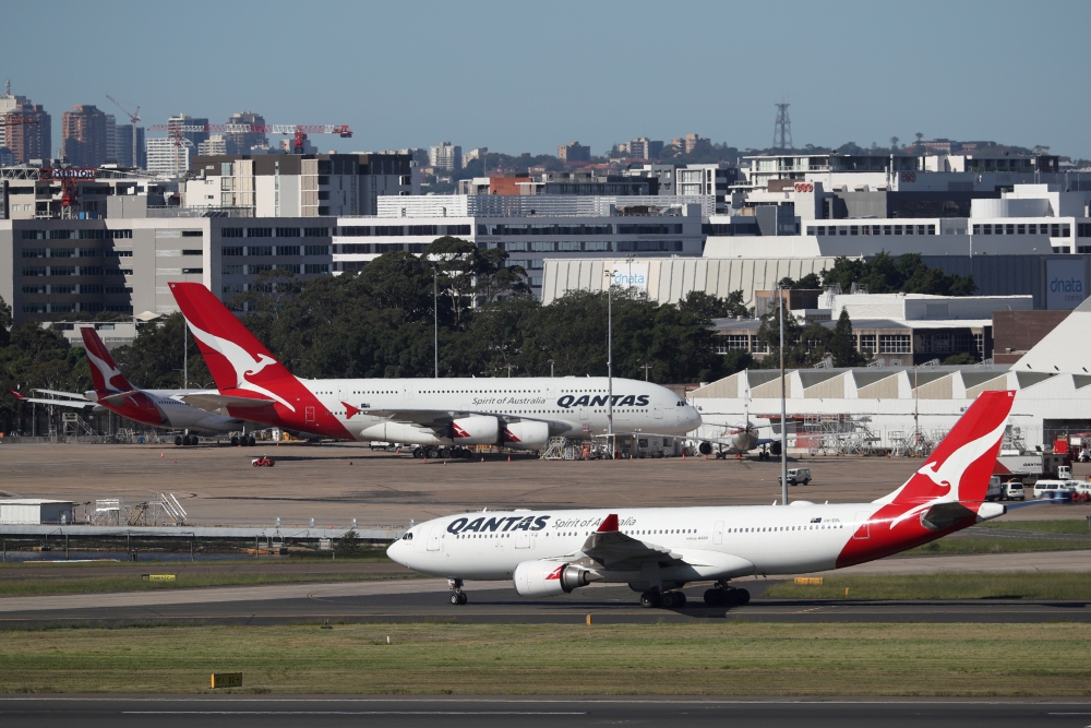 Qantas planes are seen at Kingsford Smith International Airport in Sydney. REUTERS/Loren Elliott/File Photo