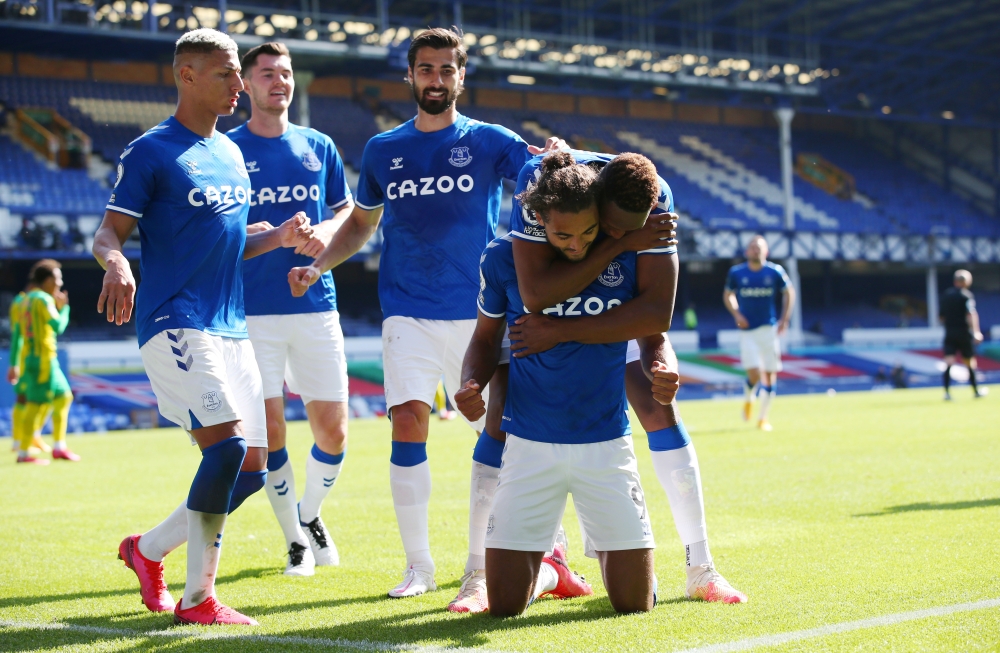 Everton's Dominic Calvert-Lewin celebrates scoring their fifth goal to complete his hat-trick Pool via REUTERS/Alex Livesey 