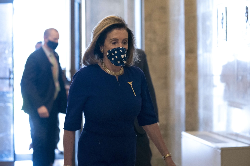 Speaker of the House Nancy Pelosi (D-CA) arrives at the U.S. Capitol on September 21, 2020 in Washington, DC. Congress has just nine days to agree on government funding before the government shuts down. Stefani Reynolds/Getty Images/AFP 
