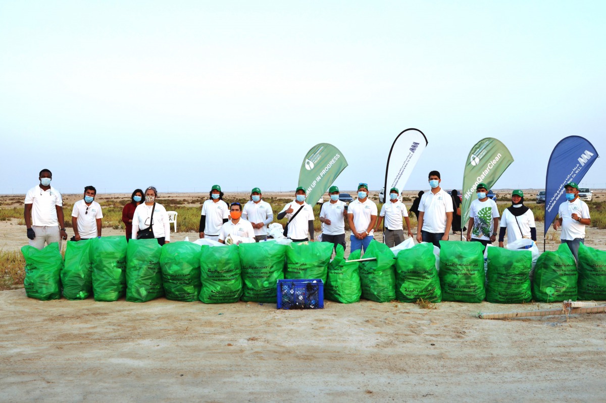 Volunteers from Abdullah Abdulghani & Bros. Co. and Doha Environmental Action Projects during the clean-up drive organised to mark the World Cleanup Day.