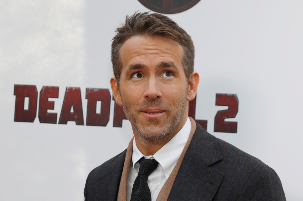 FILE PHOTO: Actor Ryan Reynolds poses on the red carpet during the premiere of 