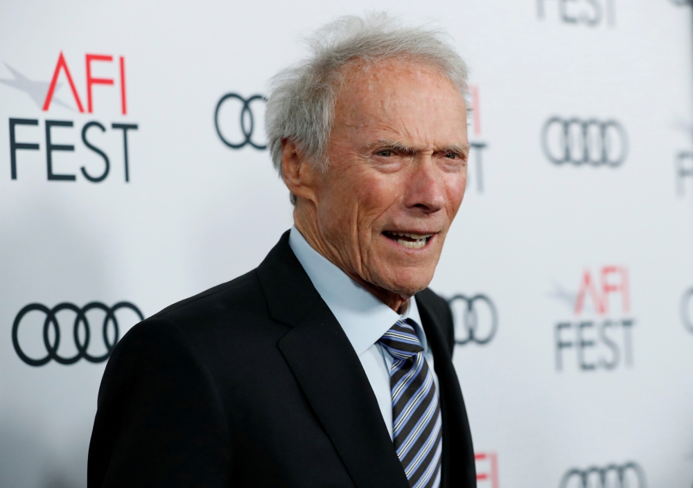 FILE PHOTO: Director Clint Eastwood poses at the premiere for the movie 