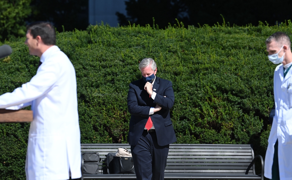White House Chief of Staff Mark Meadows (L) listens as medical staff give an update on the condition of US President Donald Trump, on October 3, 2020, at Walter Reed Medical Center in Bethesda, Maryland. AFP / Brendan Smialowski 