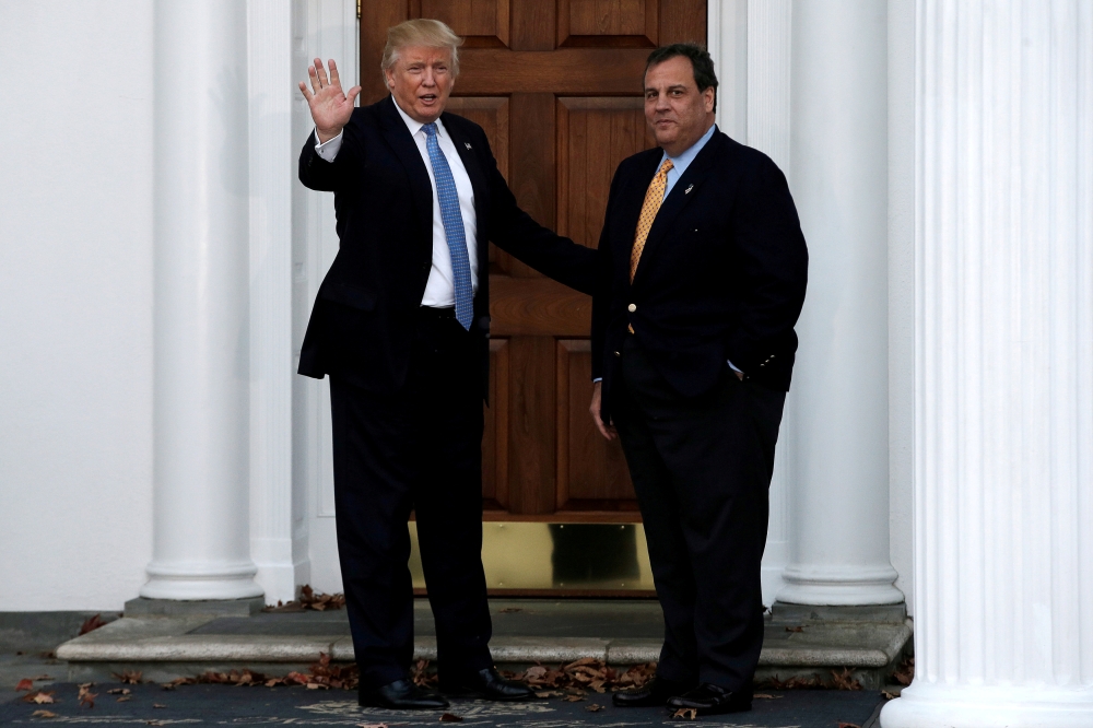 U.S. President-elect Donald Trump stands with New Jersey Governor Chris Christie before their meeting at Trump National Golf Club in Bedminster, New Jersey, U.S., November 20, 2016. REUTERS/Mike Segar/File Photo
