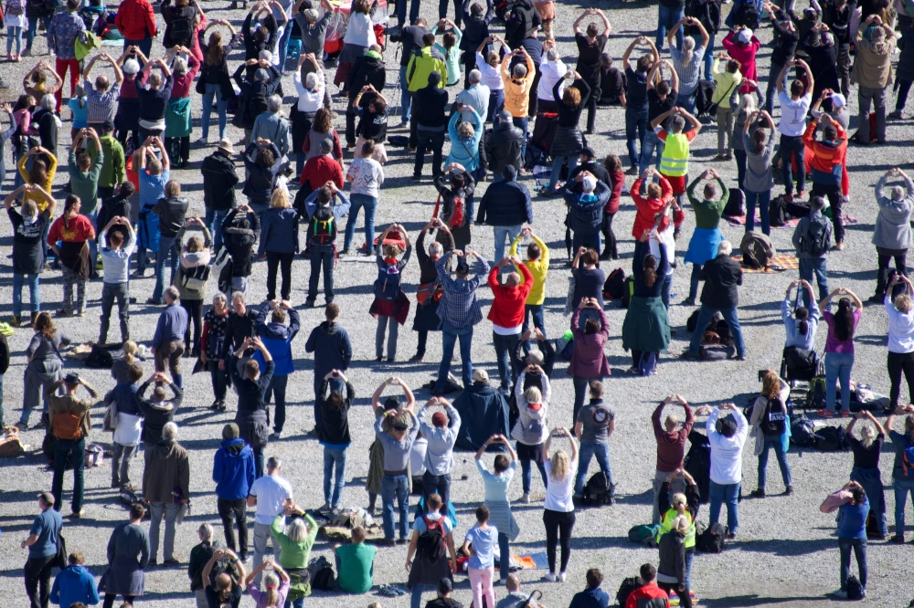 People take part in a protest against masks and virus restrictions during the ongoing Covid-19 pandemic (novel coronavirus) in Konstanz, southern Germany, on October 4, 2020. / AFP / Sébastien Bozon