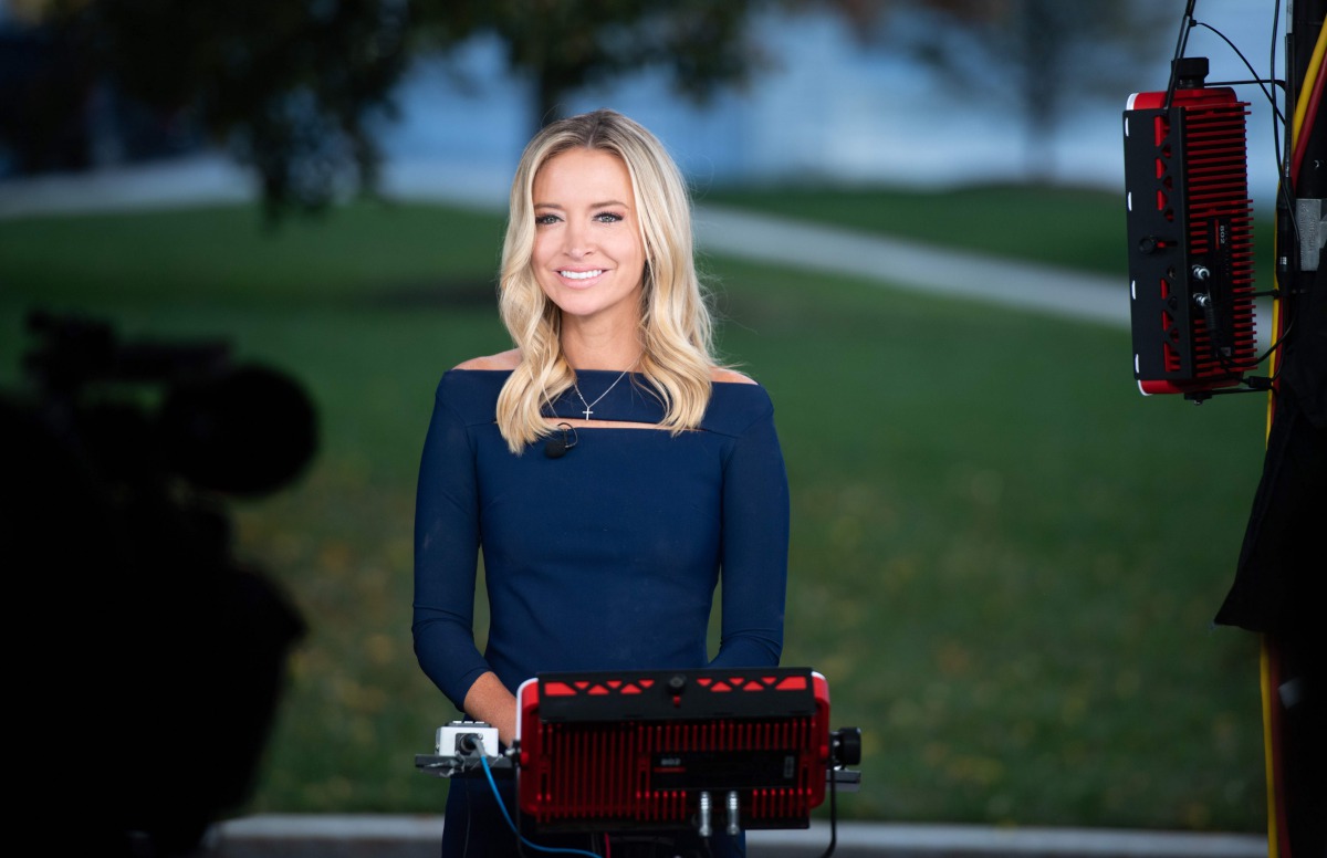 White House Press Secretary Kayleigh McEnany speaks during a television interview at the White House in Washington, DC, on October 2, 2020. Donald Trump's chief of staff said October 2, 2020, the president was experiencing 