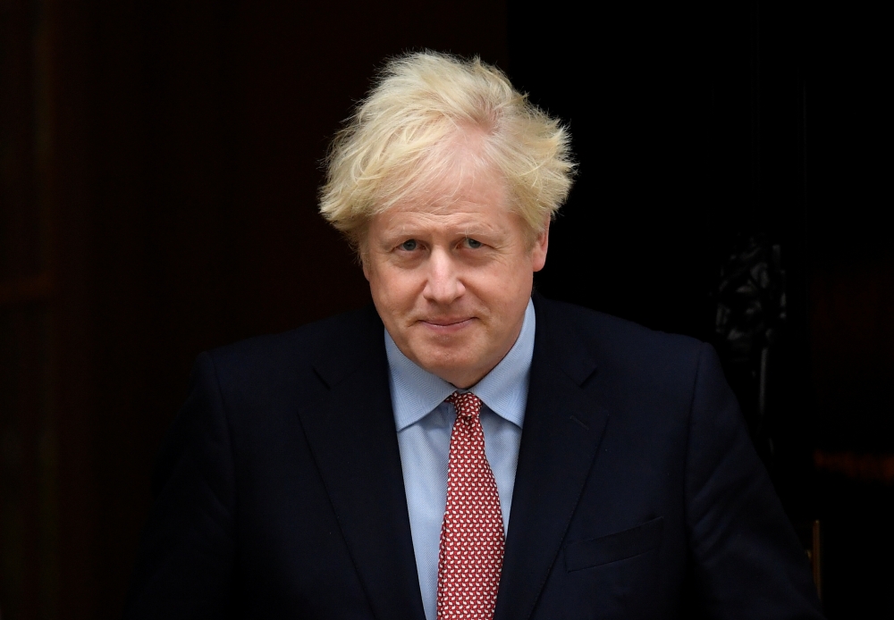 Britain's Prime Minister Boris Johnson leaves Downing Street to deliver his Conservative Party Conference virtual keynote speech, in London, Britain, October 6, 2020. REUTERS/Toby Melville