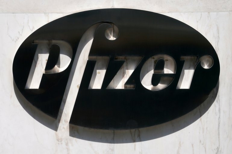 A sign is pictured outside Pfizer Headquarters in the Manhattan borough of New York City, New York, U.S., July 22, 2020. REUTERS/Carlo Allegri/File Photo
