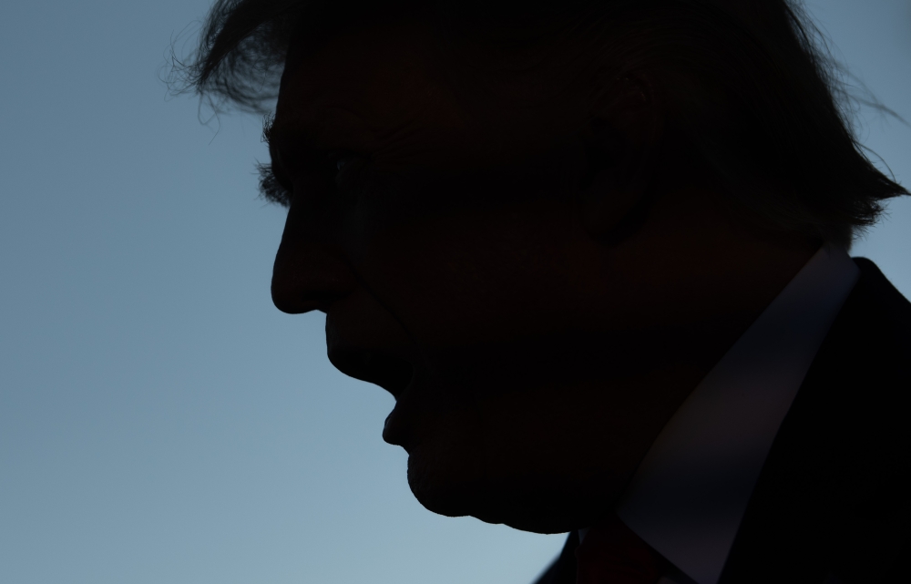 (FILES) In this file photo taken on September 21, 2020, US President Donald Trump speaks to the media prior to departing from the South Lawn of the White House in Washington, DC, as he travels to Ohio. AFP / SAUL LOEB