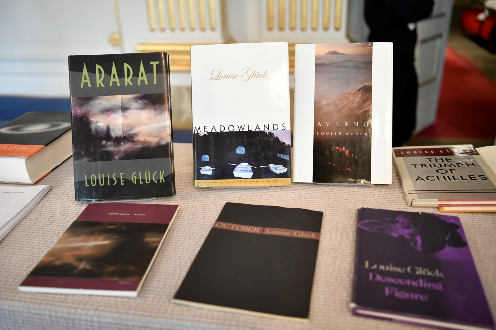 Books of American poet Louise Gluck during the announcement of 2020 Nobel Prize in literature at Borshuset in Stockholm, October 8, 2020. Gluck won the prize. TT News Agency/Henrik Montgomery/via Reuters
