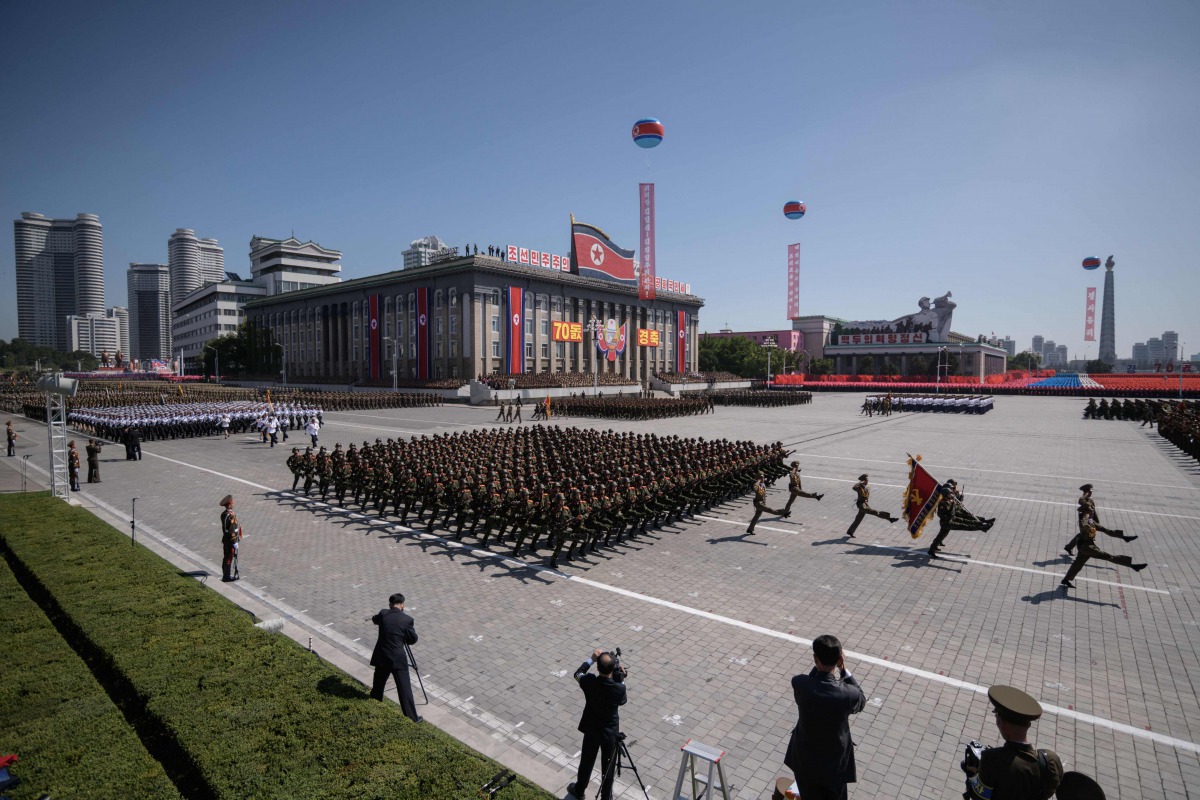 (FILES) In a file photo taken on September 9, 2018 Korean People's Army (KPA) soldiers march during a military parade and mass rally on Kim Il Sung square in Pyongyang. / AFP / Ed JONES / 