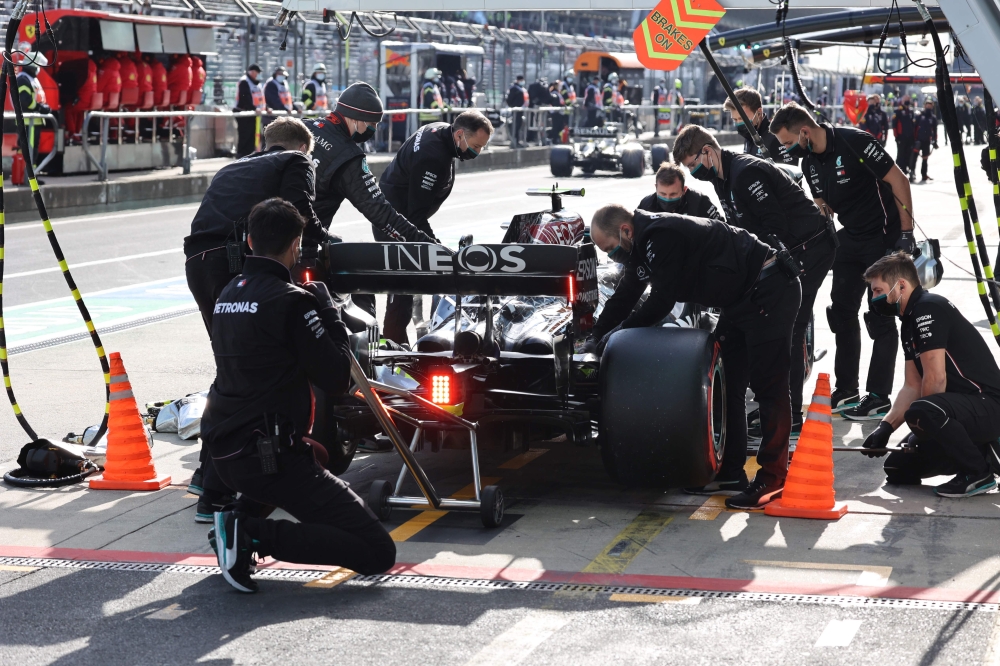 Mercedes' Finnish driver Valtteri Bottas stops in the pits as he competes during the qualifying session at the Nuerburgring circuit in Nuerburg, western Germany, on October 10, 2020, ahead of the German Formula One Eifel Grand Prix. / AFP / WOLFGANG RATTA