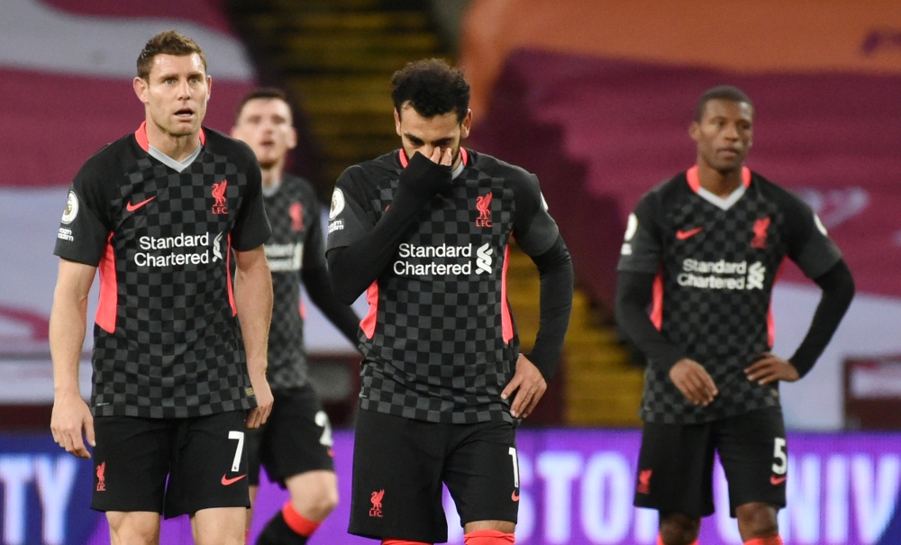 Liverpool's Mohamed Salah and James Milner look dejected after conceding their seventh goal. REUTERS/Rui Vieira EDITORIAL