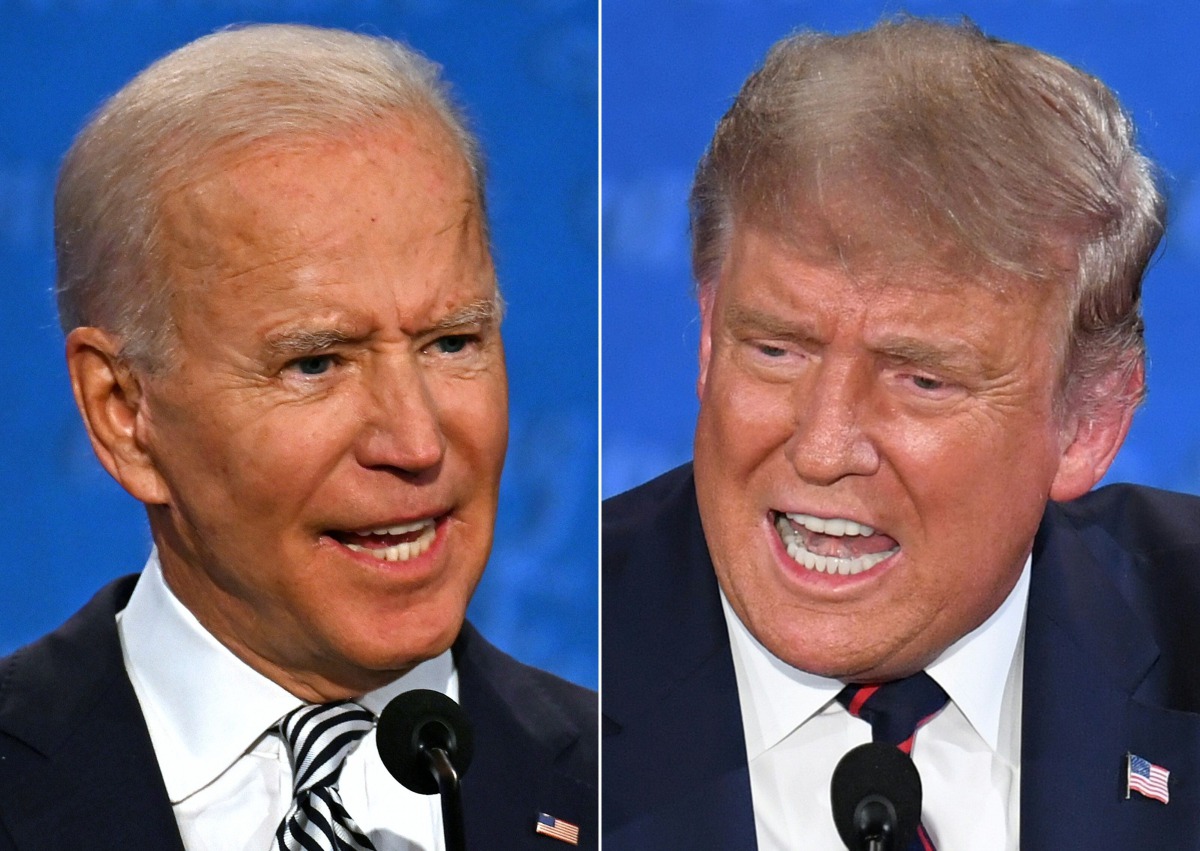 (COMBO) In this file combination of pictures created on September 29, 2020 Democratic Presidential candidate and former US Vice President Joe Biden (L) and US President Donald Trump speak during the first presidential debate at the Case Western Reserve Un