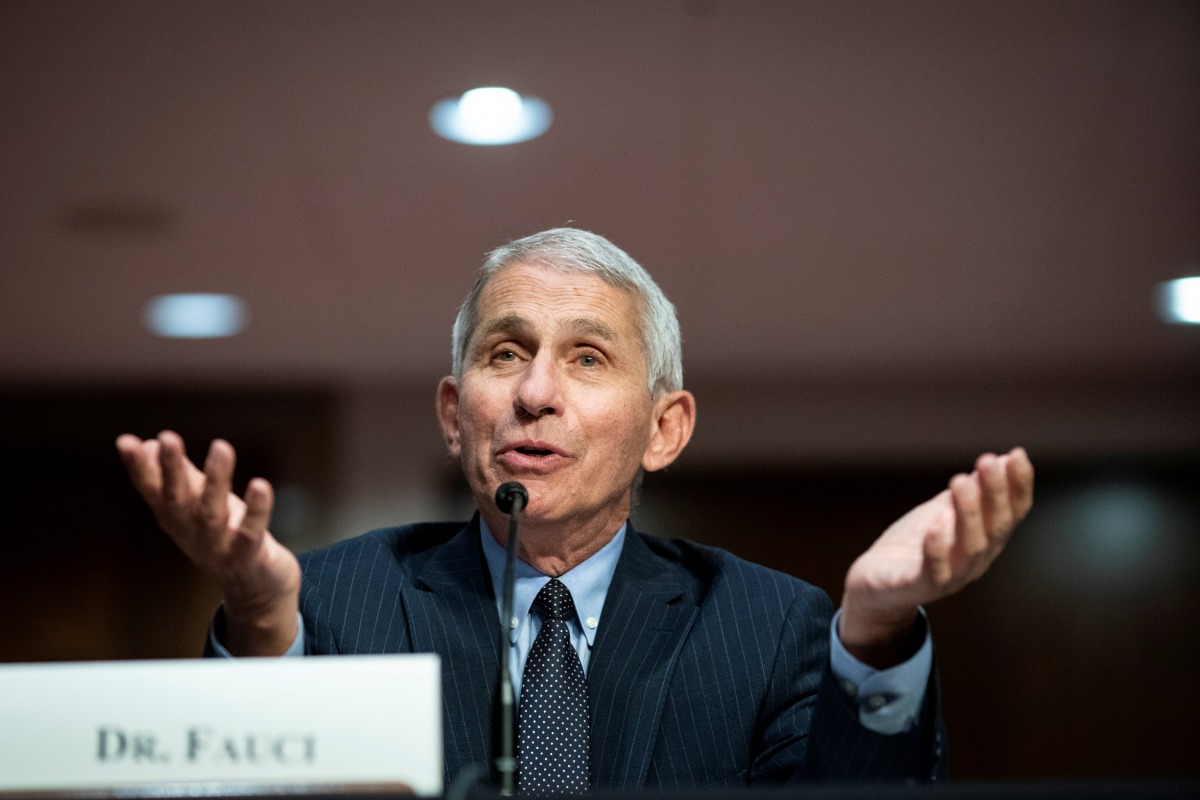 FILE PHOTO: Anthony Fauci, director of the National Institute of Allergy and Infectious Diseases, speaks during a Senate Health, Education, Labor and Pensions Committee hearing in Washington, D.C., U.S. June 30, 2020. Al Drago/Pool via REUTERS/File Photo