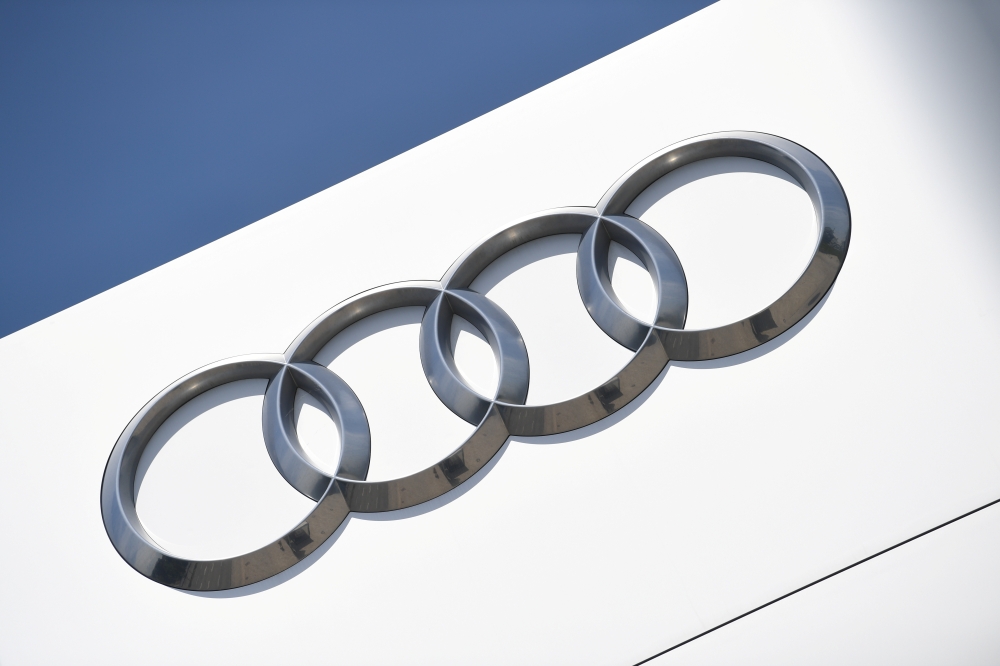 The company logo is seen at the headquarters of the German car manufacturer Audi, amid the spread of the coronavirus disease (COVID-19) in Ingolstadt, Germany, June 3, 2020. REUTERS/Andreas Gebert/File Photo