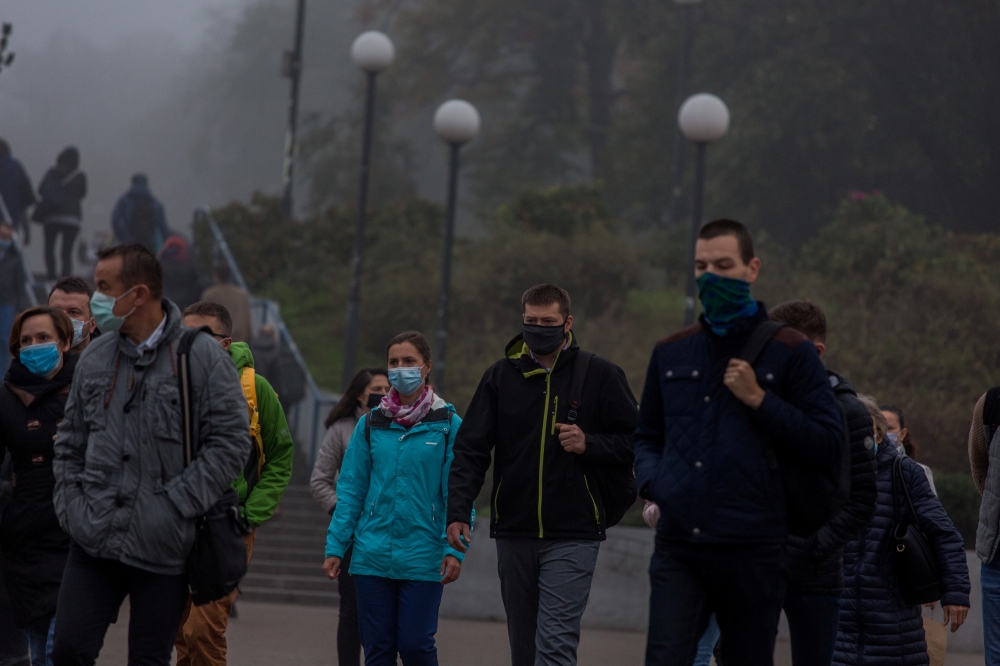 People wear masks amid the coronavirus disease (COVID-19) restrictions in Warsaw, Poland, October 16, 2020. Adam Stepien/Agencja Gazeta via REUTERS