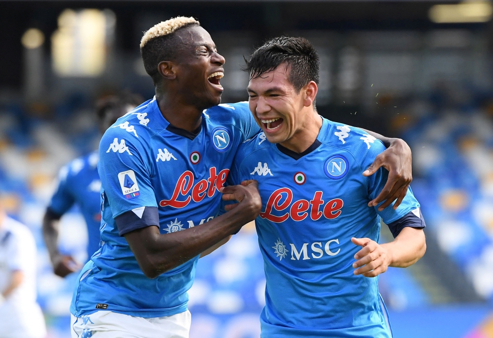 Napoli's Hirving Lozano celebrates scoring their second goal with Victor Osimhen REUTERS/Alberto Lingria 