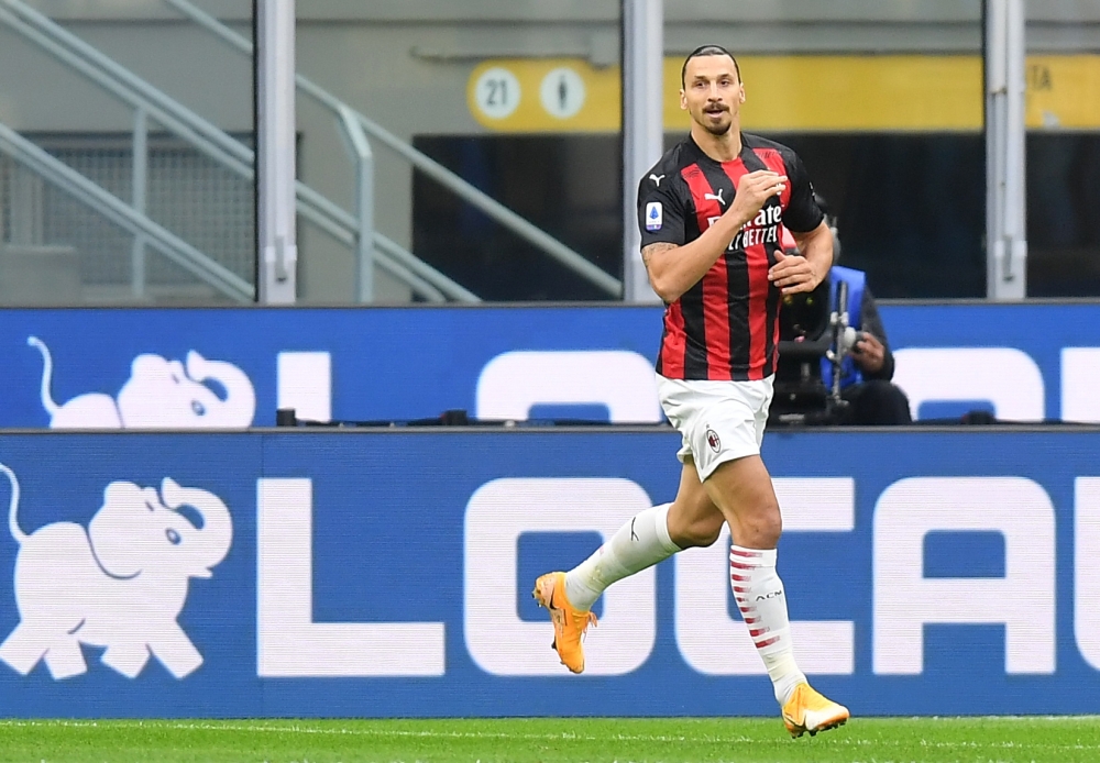 AC Milan’s Zlatan Ibrahimovic celebrates scoring their second goal REUTERS/Daniele Mascolo