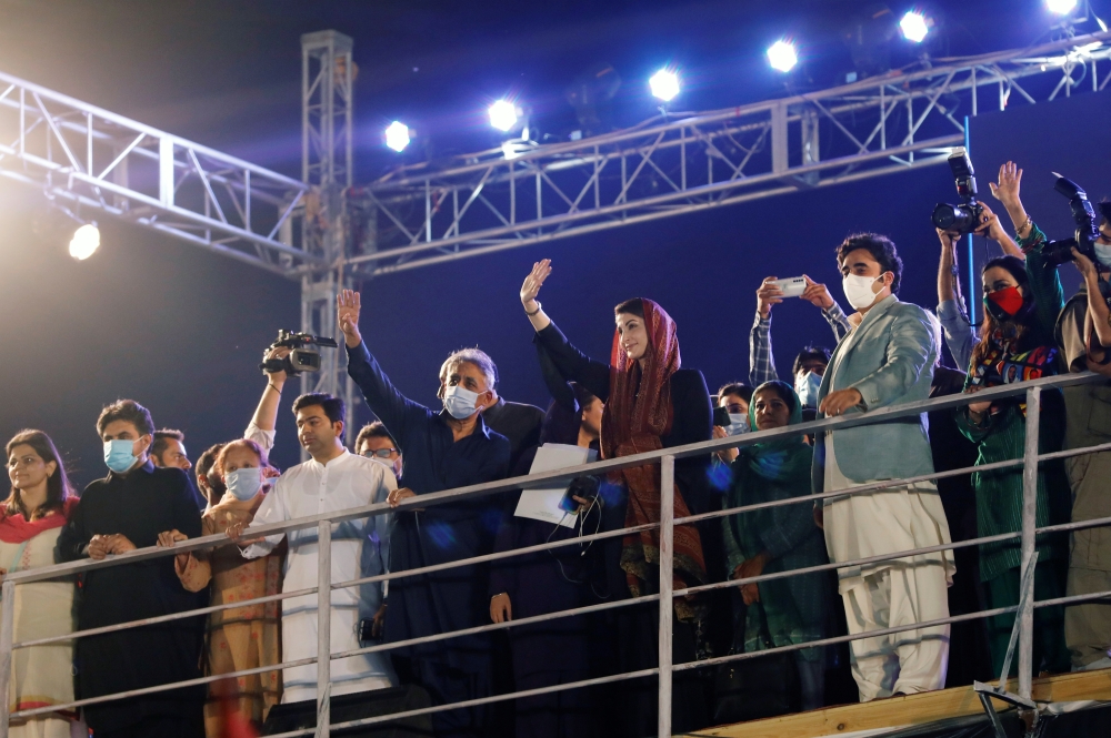 Maryam Nawaz, the daughter of Pakistan's former Prime Minister Nawaz Sharif and Bilawal Bhutto Zardari, chairman of the Pakistan Peoples Party (PPP) are seen during an anti-government protest rally organized by the Pakistan Democratic Movement (PDM), an a