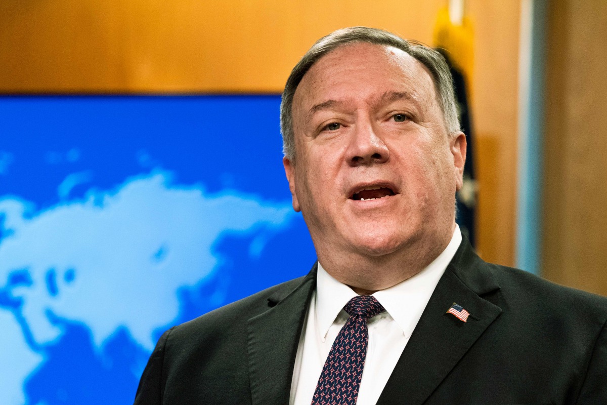 (FILES) In this file photo Secretary of State, Mike Pompeo speaks during a news conference at the State Department, October 14, 2020, in Washington, DC. / AFP / POOL / Manuel Balce CENETA
