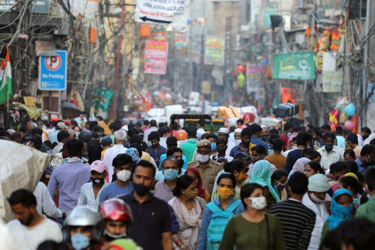 People are seen at a market amidst the spread of the coronavirus disease (COVID-19), in the old quarters of Delhi, October 19, 2020. REUTERS/Anushree Fadnavis
